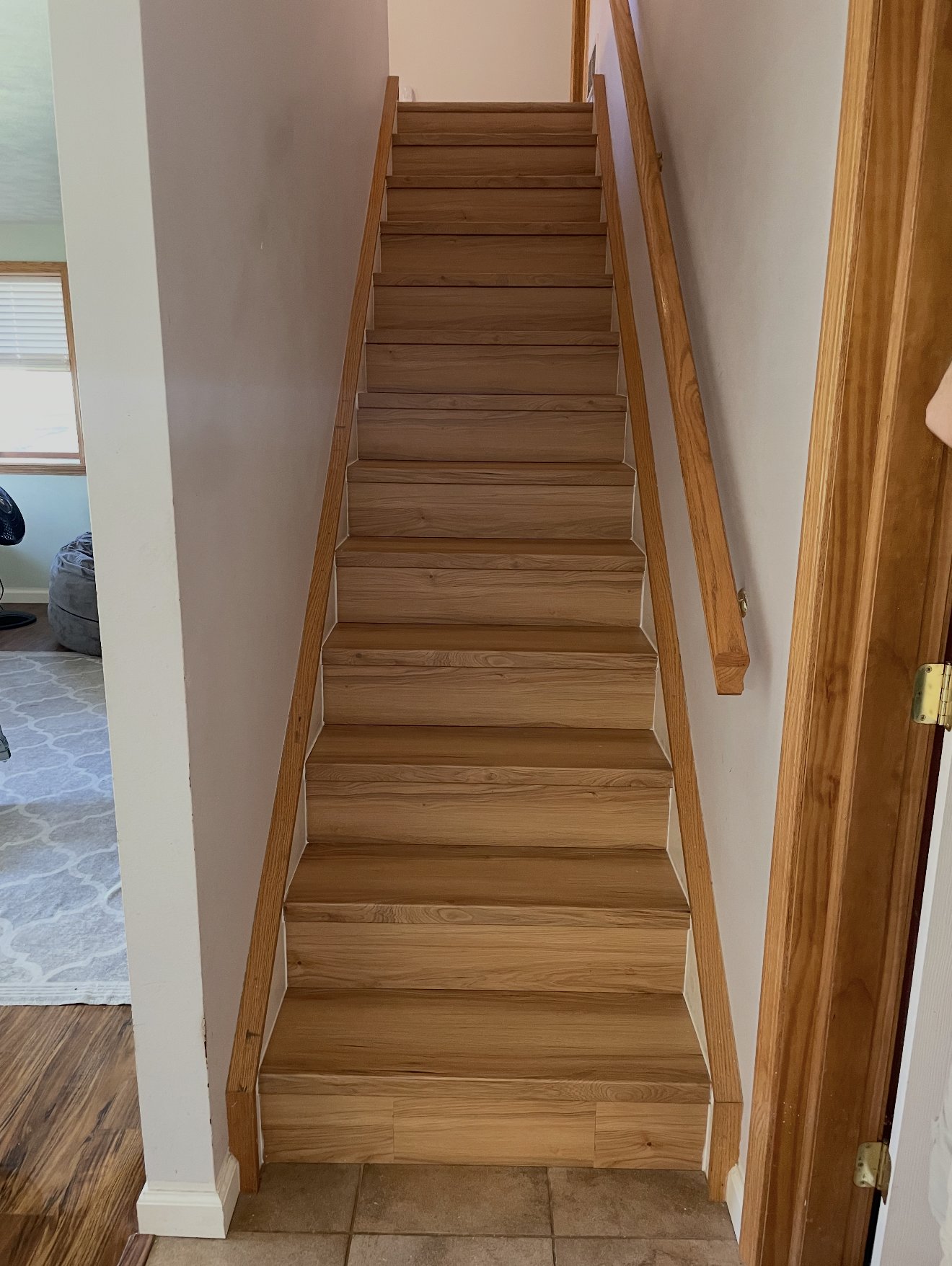 Staircase with new wood-look treads and risers